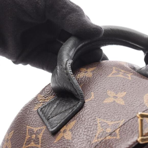 LOUIS VUITTON Black Monogram Leather Backpack - Picture 9 of 11